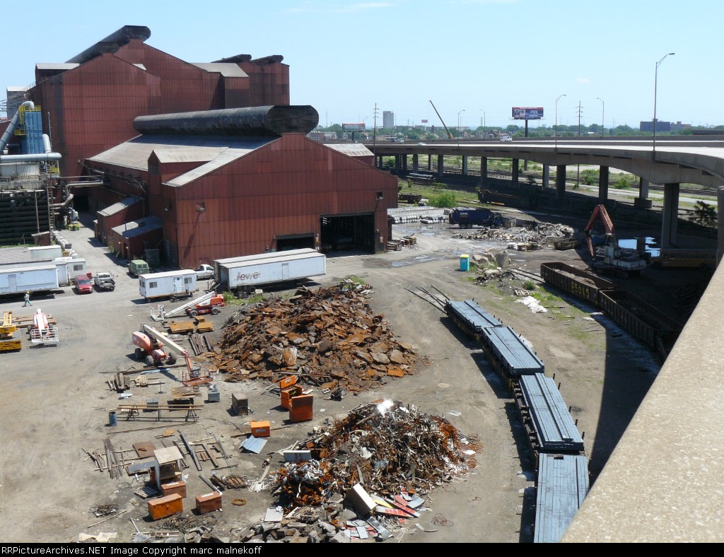 Another view with cars of bar stock visible